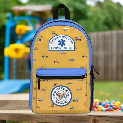 Yellow backpack with blue accents and medical-themed designs on a white background