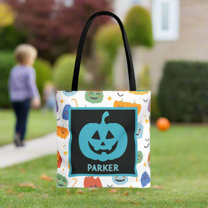 Halloween-themed tote bag with colorful design and text on a blurred background.