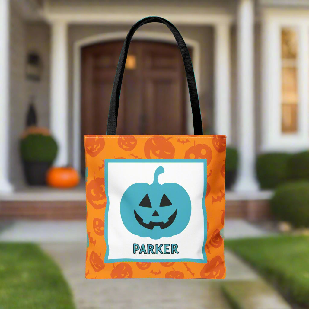 Halloween-themed tote bag with a pumpkin design and  text.