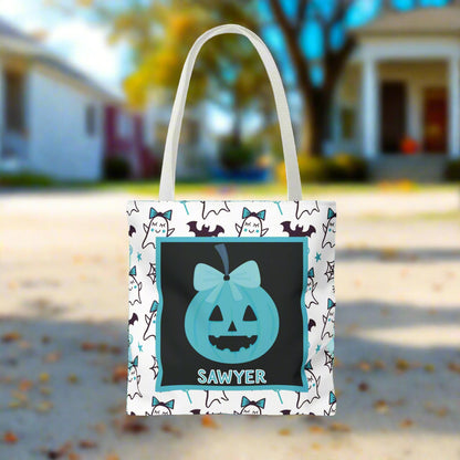 Halloween-themed treat bag with a pumpkin design and text, surrounded by white ghosts and black bats background.